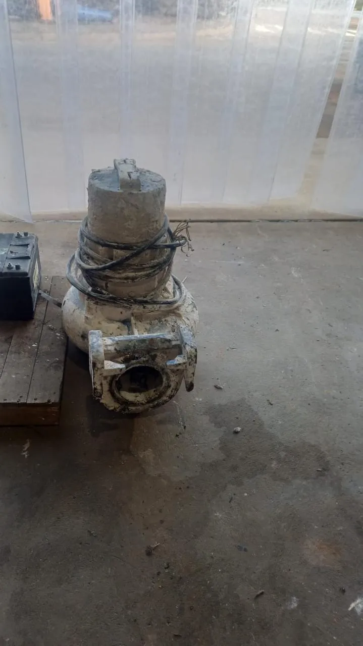 Damaged submersible pump as received for repair